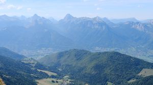 Preview wallpaper valley, trees, mountains, slope, grass