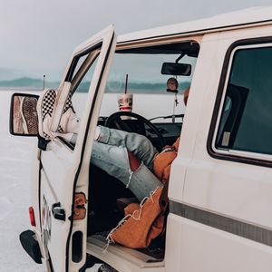 Preview wallpaper van, legs, man, travel, rest