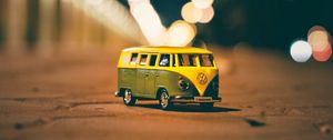 Preview wallpaper van, toy, blur, glare, bokeh
