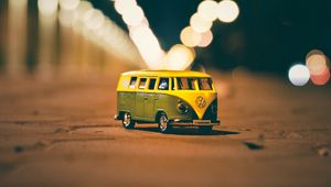 Preview wallpaper van, toy, blur, glare, bokeh