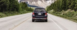 Preview wallpaper vehicle, suv, road, mountains, nature