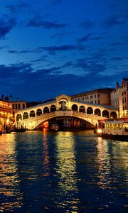 Preview wallpaper venice, canal, gondola, boat, night, lights, houses, clouds, italy