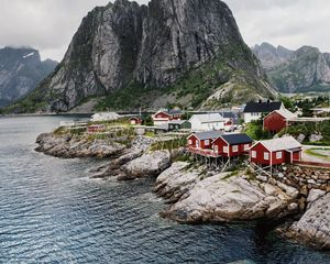 Preview wallpaper village, buildings, coast, rocks, sea