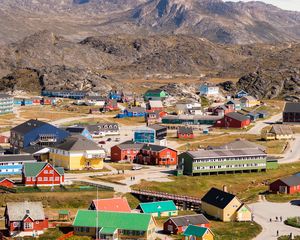 Preview wallpaper village, buildings, mountains, aerial view