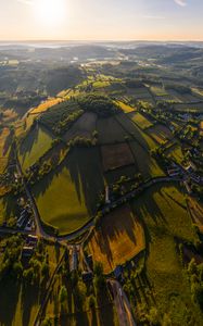 Preview wallpaper village, field, aerial view, roads, trees