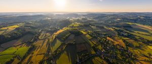 Preview wallpaper village, field, aerial view, roads, trees