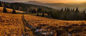 Preview wallpaper village, field, poland, mountains, grass, snow