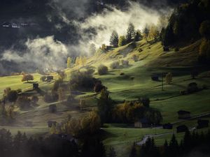 Preview wallpaper village, hills, fog, twilight