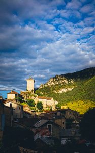 Preview wallpaper village, houses, mountains, trees, clouds, green, blue