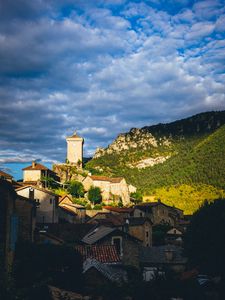 Preview wallpaper village, houses, mountains, trees, clouds, green, blue