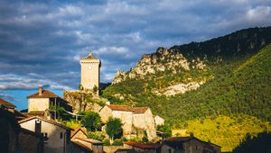 Preview wallpaper village, houses, mountains, trees, clouds, green, blue