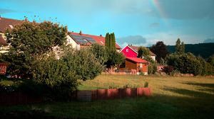 Preview wallpaper village, houses, trees, rainbow, nature