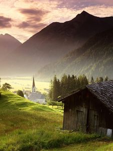 Preview wallpaper village, mountains, meadows, houses