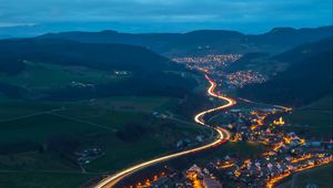 Preview wallpaper village, road, aerial view, night, mountains, switzerland