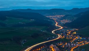 Preview wallpaper village, road, aerial view, night, mountains, switzerland