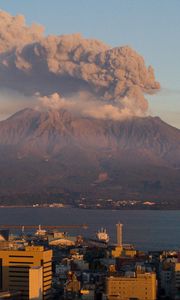 Preview wallpaper volcano, buildings, city, sea, japan