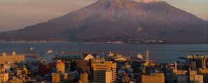 Preview wallpaper volcano, buildings, city, sea, japan