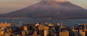 Preview wallpaper volcano, buildings, city, sea, japan