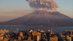 Preview wallpaper volcano, buildings, city, sea, japan