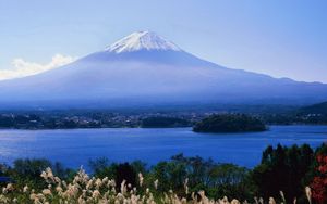 Preview wallpaper volcano, clouds, coast, top, city, water, grass