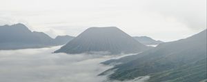 Preview wallpaper volcano, mountains, clouds, fog, landscape
