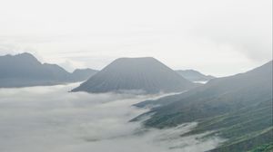 Preview wallpaper volcano, mountains, clouds, fog, landscape