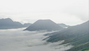 Preview wallpaper volcano, mountains, clouds, fog, landscape