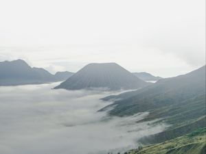 Preview wallpaper volcano, mountains, clouds, fog, landscape