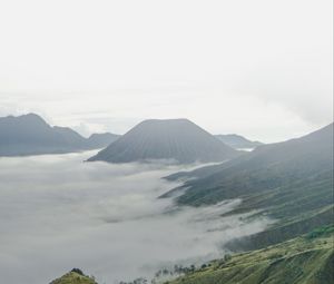 Preview wallpaper volcano, mountains, clouds, fog, landscape
