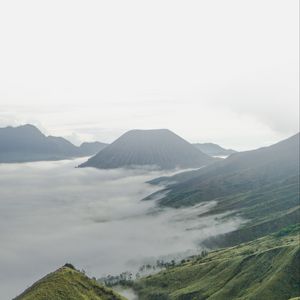 Preview wallpaper volcano, mountains, clouds, fog, landscape