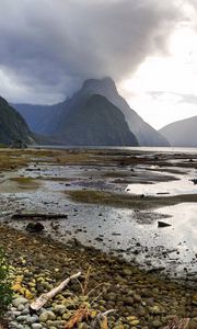 Preview wallpaper volcano, mountains, clouds, lake, pebbles