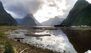 Preview wallpaper volcano, mountains, clouds, lake, pebbles