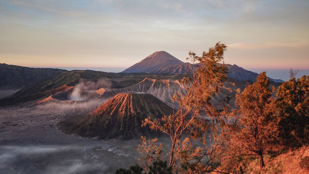 Wallpaper volcano, mountains, dawn, sunrise, grass, sky