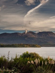 Preview wallpaper volcano, mountains, grass, sea