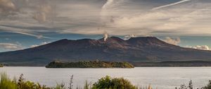 Preview wallpaper volcano, mountains, grass, sea