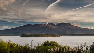 Preview wallpaper volcano, mountains, grass, sea