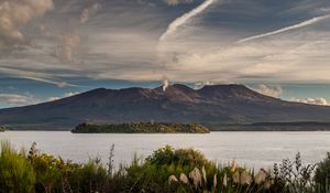 Preview wallpaper volcano, mountains, grass, sea