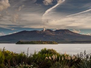 Preview wallpaper volcano, mountains, grass, sea