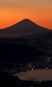 Preview wallpaper volcano, mountains, hills, lights, evening