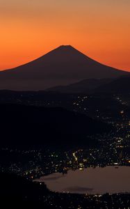 Preview wallpaper volcano, mountains, hills, lights, evening