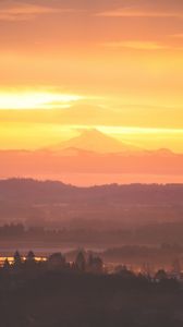 Preview wallpaper volcano, mountains, hilltop, sunset