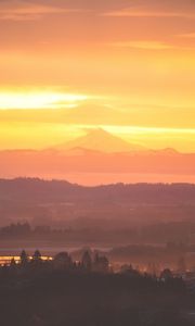 Preview wallpaper volcano, mountains, hilltop, sunset