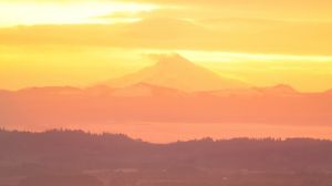 Preview wallpaper volcano, mountains, hilltop, sunset