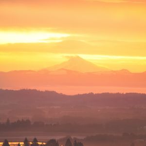 Preview wallpaper volcano, mountains, hilltop, sunset