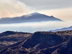 Preview wallpaper volcano, mountains, peak, hills, smoke