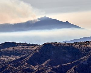 Preview wallpaper volcano, mountains, peak, hills, smoke