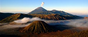 Preview wallpaper volcano, mountains, peaks, smoke