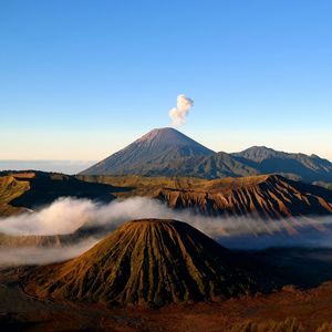 Preview wallpaper volcano, mountains, peaks, smoke