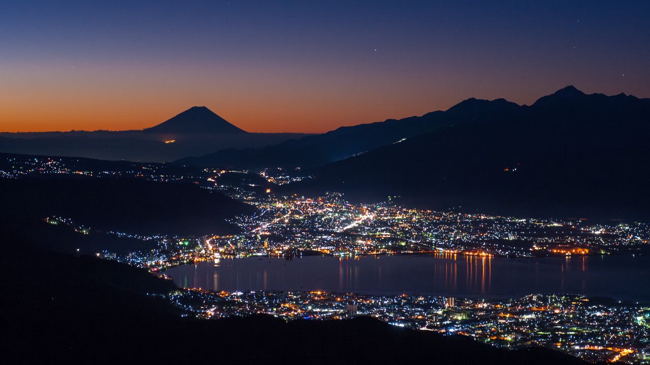 Wallpaper volcano, mountains, silhouettes, lights, bay, city, night
