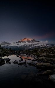 Preview wallpaper volcano, snow, snowy, stones, lake